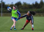 27 May 2019; Cliona Callaghan of Claremorris, Co Mayo, left, in action against Saoirse Eduway, of St Mary's, Co Mayo, during a ladies football blitz at the John West Féile na Peil Regional Launch at Connacht Centre of Excellence, Co. Mayo. Photo by Piaras Ó Mídheach/Sportsfile