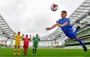 29 May 2019; The SPAR FAI Primary School 5s National Finals took place in AVIVA Stadium on Wednesday, May 29, where former Republic of Ireland International Keith Andrews and current Republic of Ireland women's footballer, Megan Campbell were in attendance supporting as girls and boys from 13 counties battled it out for national honours. The 2019 SPAR FAI Primary School 5s Programme was the biggest yet with a record 37,448 participants from 1,696 schools taking part in county, regional and provincial blitzes nationwide. Pictured is Declan Osagie, aged 13, from Offaly, with from left, Jodie Loughrey, aged 12, from Donegal, Conor Conlon Ryan, aged 12, from Limerick,  and Ellie Browne, aged 13, from Galway,  at the Aviva Stadium in Dublin.   Photo by Sam Barnes/Sportsfile