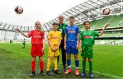 29 May 2019; Republic of Ireland Manager, Mick McCarthy was at the SPAR FAI Primary School 5s National Finals where he announced the team to take on Denmark in the UEFA European Championship Qualifiers. Mick McCarthy watched on as future stars were in action at the AVIVA Stadium with girls and boys from 13 counties battling it out for national honours. The 2019 SPAR FAI Primary School 5s Programme was the biggest yet with a record 37,448 participants from 1,696 schools taking part in county, regional and provincial blitzes nationwide. Pictured is Republic of Ireland manager Mick McCarthy, with from left, Sarah Fitzgerald, 12, from Kerry, Cahir McDaid, aged 12, from Donegal, Orlandas Jakas, aged 12, from Offaly and Adara Salvo, aged 12, from Galway. Photo by Sam Barnes/Sportsfile