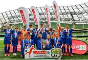 29 May 2019; The SPAR FAI Primary School 5s National Finals took place in AVIVA Stadium on Wednesday, May 29, where former Republic of Ireland International Keith Andrews and current Republic of Ireland women's footballer, Megan Campbell were in attendance supporting as girls and boys from 13 counties battled it out for national honours. The 2019 SPAR FAI Primary School 5s Programme was the biggest yet with a record 37,448 participants from 1,696 schools taking part in county, regional and provincial blitzes nationwide. Pictured are Section C Boys Winners, Scoil Mhuire Banrion, from Edenderry, Co. Offaly, and Section C Girls Winners, St Laurence's National School, from Buncrana, Co. Donegal, at the Aviva Stadium in Dublin. Photo by Sam Barnes/Sportsfile