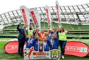 29 May 2019; The SPAR FAI Primary School 5s National Finals took place in AVIVA Stadium on Wednesday, May 29, where former Republic of Ireland International Keith Andrews and current Republic of Ireland women's footballer, Megan Campbell were in attendance supporting as girls and boys from 13 counties battled it out for national honours. The 2019 SPAR FAI Primary School 5s Programme was the biggest yet with a record 37,448 participants from 1,696 schools taking part in county, regional and provincial blitzes nationwide. Pictured is the St Laurence National School team, from Buncrana, Co. Donegal, with David Bagnall, Spar, left, after winning the Girls Section C tournament at the Aviva Stadium in Dublin. Photo by Sam Barnes/Sportsfile