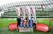 29 May 2019; The SPAR FAI Primary School 5s National Finals took place in AVIVA Stadium on Wednesday, May 29, where former Republic of Ireland International Keith Andrews and current Republic of Ireland women's footballer, Megan Campbell were in attendance supporting as girls and boys from 13 counties battled it out for national honours. The 2019 SPAR FAI Primary School 5s Programme was the biggest yet with a record 37,448 participants from 1,696 schools taking part in county, regional and provincial blitzes nationwide. Pictured are players and coaches from St. Fintan’s NS, Mayglass, Co Wexford with Spar Representative Damian West. Photo by David Fitzgerald/Sportsfile