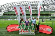 29 May 2019; The SPAR FAI Primary School 5s National Finals took place in AVIVA Stadium on Wednesday, May 29, where former Republic of Ireland International Keith Andrews and current Republic of Ireland women's footballer, Megan Campbell were in attendance supporting as girls and boys from 13 counties battled it out for national honours. The 2019 SPAR FAI Primary School 5s Programme was the biggest yet with a record 37,448 participants from 1,696 schools taking part in county, regional and provincial blitzes nationwide. Pictured are players and coaches from Lisacul NS, Castlerea, Co Roscommon with Spar Representative Peter Gaughran. Photo by David Fitzgerald/Sportsfile