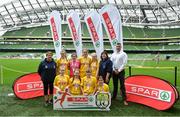29 May 2019; The SPAR FAI Primary School 5s National Finals took place in AVIVA Stadium on Wednesday, May 29, where former Republic of Ireland International Keith Andrews and current Republic of Ireland women's footballer, Megan Campbell were in attendance supporting as girls and boys from 13 counties battled it out for national honours. The 2019 SPAR FAI Primary School 5s Programme was the biggest yet with a record 37,448 participants from 1,696 schools taking part in county, regional and provincial blitzes nationwide. Pictured are players and coaches from Scoil Mhuire Caiseal, Co Donegal with Spar Representative Colm McDaid. Photo by David Fitzgerald/Sportsfile