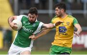 26 May 2019; Kane Connor of Fermanagh in action against Ryan McHugh of Donegal during the Ulster GAA Football Senior Championship Quarter-Final match between Fermanagh and Donegal at Brewster Park in Enniskillen, Fermanagh. Photo by Oliver McVeigh/Sportsfile