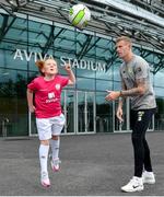 29 May 2019; Republic of Ireland International James McClean with Eden Murphy, age 9, from Ringsend, Co Dublin at the Aviva Soccer Sisters Dream Camp in Aviva Stadium. Over 100 girls were given the opportunity to play on the same pitch as their international heroes. This year’s Aviva Soccer Sisters saw a 107% increase on last year’s figures, with 7,322 girls participating in this year’s Easter festival throughout the country. See aviva.ie/soccersisters or check out #SafeToDream on social media for further details. Photo by David Fitzgerald/Sportsfile