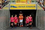 29 May 2019; Players from Arthur Griffith Park FC, Co Dublin, right, and Ballyduff FC, Co Waterford, walk out the tunnel prior to the Aviva Soccer Sisters Dream Camp in Aviva Stadium. Over 100 girls were given the opportunity to play on the same pitch as their international heroes. This year’s Aviva Soccer Sisters saw a 107% increase on last year’s figures, with 7,322 girls participating in this year’s Easter festival throughout the country. See aviva.ie/soccersisters or check out #SafeToDream on social media for further details. Photo by David Fitzgerald/Sportsfile