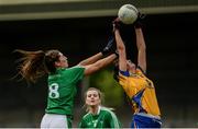 1 June 2019; Aisling Reidy of Clare in action against Loretta Hanley of Limerick during the Munster Ladies Football Intermediate Championship match between Clare and Limerick at Cusack Park in Ennis, Co Clare. Photo by Diarmuid Greene/Sportsfile