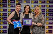 31 May 2019; The 2019 Teams of the Lidl Ladies National Football League awards were presented at Croke Park on Friday, May 31. The best players from the four divisions in the Lidl National Football Leagues were selected by the LGFA’s All Star committee. Martina O'Brien of Cork is pictured receiving her Division 1 award from Marie Hickey, Ladies Gaelic Football Association President, and Sian Gray, Head of Marketing, Lidl Ireland. Photo by David Fitzgerald/Sportsfile