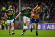 1 June 2019; David Moran of Kerry in action against Sean O'Donoghue of Clare during the Munster GAA Football Senior Championship semi-final match between Clare and Kerry at Cusack Park in Ennis, Co Clare. Photo by Diarmuid Greene/Sportsfile