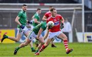 1 June 2019; Stephen Sherlock of Cork in action against Peter Nash of Limerick during the Munster GAA Football Senior Championship semi-final match between Cork and Limerick at Páirc Ui Rinn in Cork. Photo by Matt Browne/Sportsfile