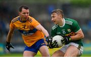 1 June 2019; James O'Donoghue of Kerry of Kerry in action against Kevin Harnett of Clare of Clare during the Munster GAA Football Senior Championship semi-final match between Clare and Kerry at Cusack Park in Ennis, Co Clare. Photo by Diarmuid Greene/Sportsfile