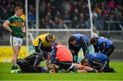 1 June 2019; Sean O'Shea of Kerry and Kevin Harnett of Clare receive medical attention after they collided during the Munster GAA Football Senior Championship semi-final match between Clare and Kerry at Cusack Park in Ennis, Co Clare. Photo by Diarmuid Greene/Sportsfile