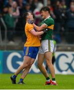 1 June 2019; Kevin Harnett of Clare and David Clifford of Kerry tussle off the ball during the Munster GAA Football Senior Championship semi-final match between Clare and Kerry at Cusack Park in Ennis, Co Clare. Photo by Diarmuid Greene/Sportsfile