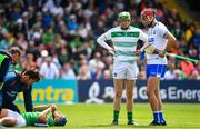 2 June 2019; Nickie Quaid of Limerick in conversation with Maurice Shanahan of Waterford as Mike Casey of Limerick receives medical treatment during the Munster GAA Hurling Senior Championship Round 3 match between Waterford and Limerick at Walsh Park in Waterford. Photo by Ramsey Cardy/Sportsfile