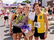 2 June 2019; Aoibhe Richardson, centre, with her mother, Niamh Richardson, right and her sister, Grace Richardson, from Kilkenny City Harriers celebrate finishing the 2019 Vhi Women’s Mini Marathon. 30,000 women from all over the country took to the streets of Dublin to run, walk and jog the 10km route, raising much needed funds for hundreds of charities around the country. www.vhiwomensminimarathon.ie. Photo by Sam Barnes/Sportsfile