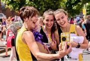 2 June 2019; Aoibhe Richardson, right, with her mother, Naimh Richardson, left and her sister, Grace Richardson, centre, from Kilkenny City Harriers celebrate finishing the 2019 Vhi Women’s Mini Marathon. 30,000 women from all over the country took to the streets of Dublin to run, walk and jog the 10km route, raising much needed funds for hundreds of charities around the country. www.vhiwomensminimarathon.ie. Photo by Sam Barnes/Sportsfile