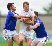 2 June 2019; Peter Kelly of Kildare in action against Barry McKeon, left, and Gary Rogers of Longford during Leinster GAA Football Senior Championship Quarter-Final Replay match between Longford and Kildare at Bord na Mona O'Connor Park in Tulamore, Offaly. Photo by Matt Browne/Sportsfile