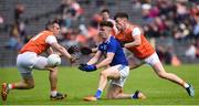 2 June 2019; Dara McVeety of Cavan in action against Mark Shields and Paul Hughes of Armagh during the Ulster GAA Football Senior Championship Semi-Final match between Cavan and Armagh at St Tiernach's Park in Clones, Monaghan. Photo by Oliver McVeigh/Sportsfile