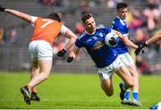 2 June 2019; Conor Madden of Cavan in action against Aidan Forker of Armagh during the Ulster GAA Football Senior Championship Semi-Final match between Cavan and Armagh at St Tiernach's Park in Clones, Monaghan. Photo by Oliver McVeigh/Sportsfile