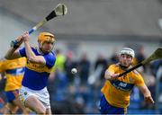 2 June 2019; Séamus Callanan of Tipperary shoots to score his side's second goal, despite the efforts of Patrick O'Connor of Clare, which made him Tipperary's record all-time highest championship goal-scorer, during the Munster GAA Hurling Senior Championship Round 3 match between Clare and Tipperary at Cusack Park in Ennis, Co Clare. Photo by Piaras Ó Mídheach/Sportsfile