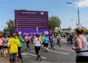 2 June 2019; Participants run to the Wall of Support in the 2019 Vhi Women’s Mini Marathon. 30,000 women from all over the country took to the streets of Dublin to run, walk and jog the 10km route, raising much needed funds for hundreds of charities around the country. www.vhiwomensminimarathon.ie.  Photo by Harry Murphy/Sportsfile