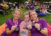 2 June 2019; Sandra Kingston, left, from Swords, Dublin, Ruby McDermot, Coolock, Dublin and Sinead McDermot, Coolock, Dublin in the relaxation area following the 2019 Vhi Women’s Mini Marathon. 30,000 women from all over the country took to the streets of Dublin to run, walk and jog the 10km route, raising much needed funds for hundreds of charities around the country. For further information please log on to www.vhiwomensminimarathon.ie. Photo by Eóin Noonan/Sportsfile