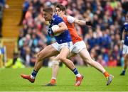 2 June 2019; Killian Clarke of Cavan in action against Andy Murnin of Armagh during the Ulster GAA Football Senior Championship Semi-Final match between Cavan and Armagh at St Tiernach's Park in Clones, Monaghan. Photo by Oliver McVeigh/Sportsfile