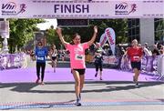 2 June 2019; Runners celebrate after finishing the 2019 Vhi Women’s Mini Marathon. 30,000 women from all over the country took to the streets of Dublin to run, walk and jog the 10km route, raising much needed funds for hundreds of charities around the country. www.vhiwomensminimarathon.ie.  Photo by Sam Barnes/Sportsfile