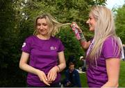 2 June 2019; Ewillina Blazke, right, with, Joana Dawice from Swords, Dublin using the dry shampoo provided outside the refresher rooms in the relaxation area following the 2019 Vhi Women’s Mini Marathon. 30,000 women from all over the country took to the streets of Dublin to run, walk and jog the 10km route, raising much needed funds for hundreds of charities around the country. For further information please log on to www.vhiwomensminimarathon.ie. Photo by Eóin Noonan/Sportsfile