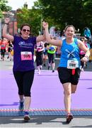 2 June 2019;  Particpants celebrate finishing the 2019 Vhi Women’s Mini Marathon. 30,000 women from all over the country took to the streets of Dublin to run, walk and jog the 10km route, raising much needed funds for hundreds of charities around the country. www.vhiwomensminimarathon.ie.  Photo by Sam Barnes/Sportsfile