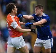 2 June 2019; Andy Murnin of Armagh tussles with Stephen Murray of Cavan in dispute during the Ulster GAA Football Senior Championship Semi-Final match between Cavan and Armagh at St Tiernach's Park in Clones, Monaghan. Photo by Oliver McVeigh/Sportsfile