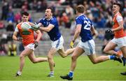 2 June 2019; Gearoid McKiernan of Cavan in action against Joe McElroy of Armagh during the Ulster GAA Football Senior Championship Semi-Final match between Cavan and Armagh at St Tiernach's Park in Clones, Monaghan. Photo by Oliver McVeigh/Sportsfile