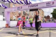 2 June 2019; Partipants celebrate after finishing the 2019 Vhi Women’s Mini Marathon. 30,000 women from all over the country took to the streets of Dublin to run, walk and jog the 10km route, raising much needed funds for hundreds of charities around the country. www.vhiwomensminimarathon.ie.  Photo by Sam Barnes/Sportsfile