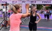 2 June 2019; Participants celebrate after finishing the 2019 Vhi Women’s Mini Marathon. 30,000 women from all over the country took to the streets of Dublin to run, walk and jog the 10km route, raising much needed funds for hundreds of charities around the country. www.vhiwomensminimarathon.ie.  Photo by Sam Barnes/Sportsfile