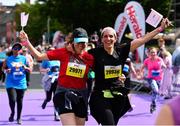 2 June 2019; Partipants celebrate after finishing the 2019 Vhi Women’s Mini Marathon. 30,000 women from all over the country took to the streets of Dublin to run, walk and jog the 10km route, raising much needed funds for hundreds of charities around the country. www.vhiwomensminimarathon.ie.  Photo by Sam Barnes/Sportsfile