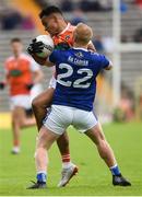 2 June 2019; Jemar Hall of Armagh in action against Cian Mackey of Cavan during the Ulster GAA Football Senior Championship Semi-Final match between Cavan and Armagh at St Tiernach's Park in Clones, Monaghan. Photo by Oliver McVeigh/Sportsfile
