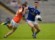 2 June 2019; Conor Madden of Cavan in action against Aidan Nugent of Armagh during the Ulster GAA Football Senior Championship Semi-Final match between Cavan and Armagh at St Tiernach's Park in Clones, Monaghan. Photo by Oliver McVeigh/Sportsfile