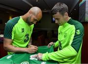 2 June 2019; Republic of Ireland goalkeeper Darren Randolph and team captain Seamus Coleman sign autographs during the CRISC Player of the Year Awards at Crowne Plaza Hotel in Blanchardstown, Dublin. Photo by Matt Browne/Sportsfile