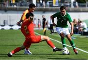 3 June 2019; Zach Elbouzedi of Republic of Ireland in action against Lei Tong of China during the 2019 Maurice Revello Toulon Tournament match between China and Republic of Ireland at Stade de Lattre de Tassigny in Aubagne, France. Photo by Alexandre Dimou/Sportsfile