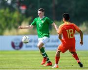 3 June 2019; Conor Coventry of Ireland in action against Cong Huang of China during the 2019 Maurice Revello Toulon Tournament match between China and Republic of Ireland at Stade de Lattre de Tassigny in Aubagne, France. Photo by Alexandre Dimou/Sportsfile