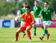 3 June 2019; Huanhuan Shan of China in action against Conor Coventry of Ireland during the 2019 Maurice Revello Toulon Tournament match between China and Republic of Ireland at Stade de Lattre de Tassigny in Aubagne, France. Photo by Alexandre Dimou/Sportsfile