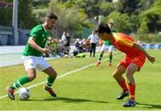 3 June 2019; Zach Elbouzedi of Ireland in action against Jiabao Wen of China during the 2019 Maurice Revello Toulon Tournament match between China and Republic of Ireland at Stade de Lattre de Tassigny in Aubagne, France. Photo by Alexandre Dimou/Sportsfile