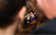 4 June 2019; Katie Taylor arrives back to Dublin Airport following her Undisputed Female World Lightweight Championship bout victory against Delfine Persoon at Madison Square Garden in New York, USA, on Saturday. Pictured is Undisputed World Lightweight Champion Katie Taylor takes a selfie with a fan at Dublin Airport in Dublin. Photo by Harry Murphy/Sportsfile