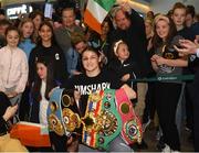 4 June 2019; Katie Taylor arrives back to Dublin Airport following her Undisputed Female World Lightweight Championship bout victory against Delfine Persoon at Madison Square Garden in New York, USA, on Saturday. Pictured is Undisputed World Lightweight Champion Katie Taylor is welcomed by fans at Dublin Airport in Dublin. Photo by Harry Murphy/Sportsfile