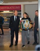 4 June 2019; Katie Taylor arrives back to Dublin Airport following her Undisputed Female World Lightweight Championship bout victory against Delfine Persoon at Madison Square Garden in New York, USA, on Saturday. Pictured is Undisputed World Lightweight Champion Katie Taylor, with Minister for Transport, Tourism and Sport Shane Ross T.D., left, and manager Brian Peters, right, at Dublin Airport in Dublin. Photo by Harry Murphy/Sportsfile