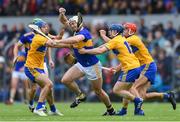 2 June 2019; Pádraic Maher of Tipperary in action against Clare players, from left, Shane O'Donnell, Podge Collins, and Peter Duggan during the Munster GAA Hurling Senior Championship Round 3 match between Clare and Tipperary at Cusack Park in Ennis, Co Clare. Photo by Piaras Ó Mídheach/Sportsfile