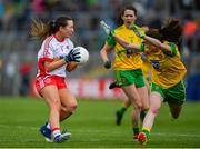 8 June 2019; Slaine McCarroll of Tyrone in action against Roisin Rogers of Donegal during the TG4 Ulster Senior Championship Preliminary Round match between Donegal and Tyrone at Kingspan Breffni Park in Cavan. Photo by Ramsey Cardy/Sportsfile