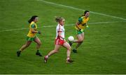8 June 2019; Neamh Woods of Tyrone in action against Anna Marie McGlynn, left, and Emer Gallagher of Donegal during the TG4 Ulster Senior Championship Preliminary Round match between Donegal and Tyrone at Kingspan Breffni Park in Cavan. Photo by Daire Brennan/Sportsfile