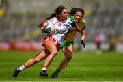 8 June 2019; Niamh Hughes of Tyrone in action against Amy Boyle Carr of Donegal during the TG4 Ulster Senior Championship Preliminary Round match between Donegal and Tyrone at Kingspan Breffni Park in Cavan. Photo by Ramsey Cardy/Sportsfile